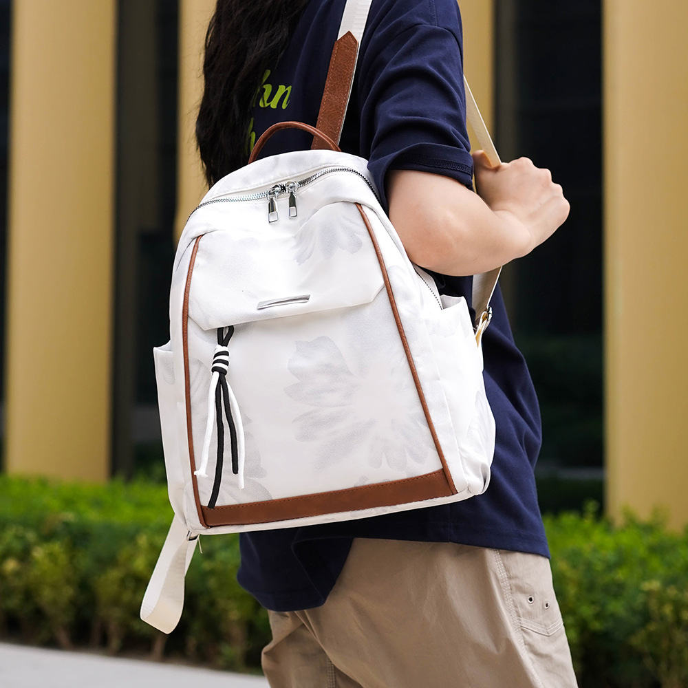 Mochila escolar para estudiantes de gran venta en Amazon, mochila con estampado de tela Oxford de gran capacidad, mochila impermeable para viajes de ocio para mujer