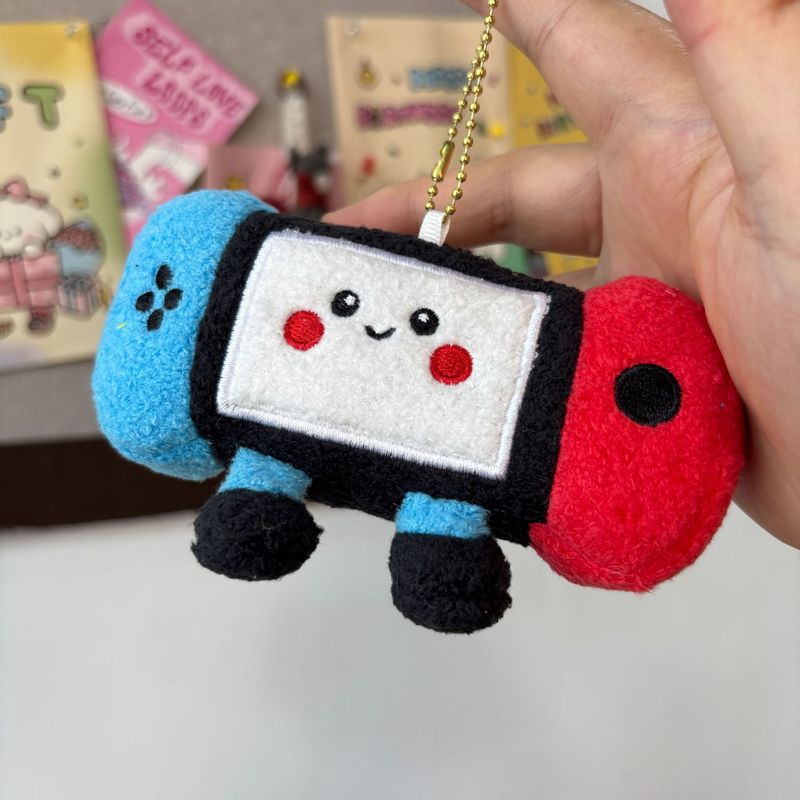 かわいいクリエイティブゲームコンソール赤と青のレトロなぬいぐるみクリエイティブバッグキーホルダー人形ゲームシティグラブマシン人形|undefined