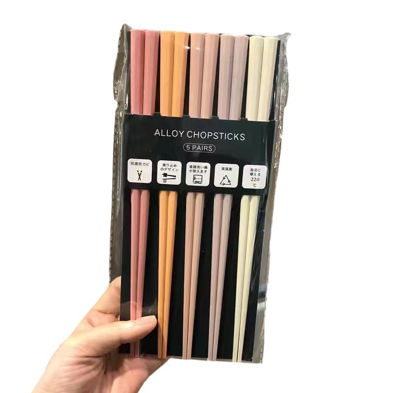 palillos una persona un pequeño libro rojo Morandi color octavo rosa corazón de la niña macarón conjunto de palillos sin pintura