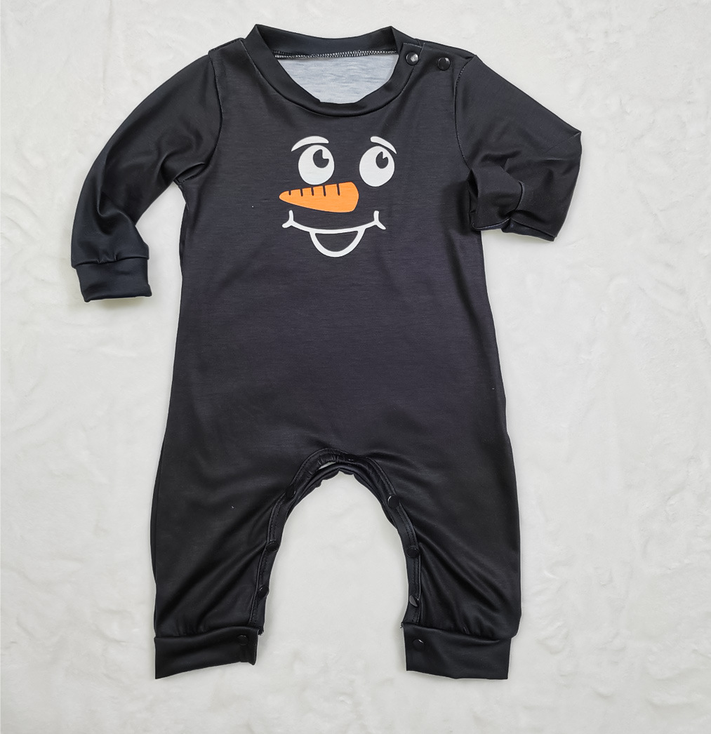 Vestito da casa stampato con pigiama natalizio a quadri con cartoni animati natalizi_voghion.com