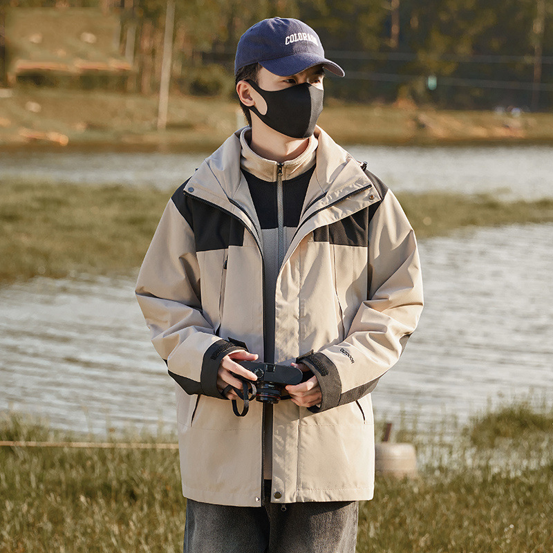 La misma marca al aire libre chaqueta de asalto hombre y mujer 3 en 1 abrigo desmontable 2025 nuevo a prueba de viento impermeable primavera y otoño