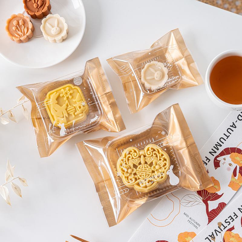 Ventana de oro gruesa mini pastel de luna bolsa de sellado de máquina nueva bolsa de embalaje de huevo de flujo cóncavo lateral del corazón del mediado otoño