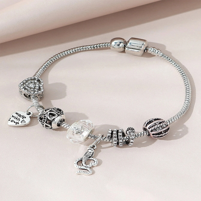 Panjia pulsera Dora DIY cuentas transfronterizas explosión amor letras colgante cobra corazon pulsera de diamante