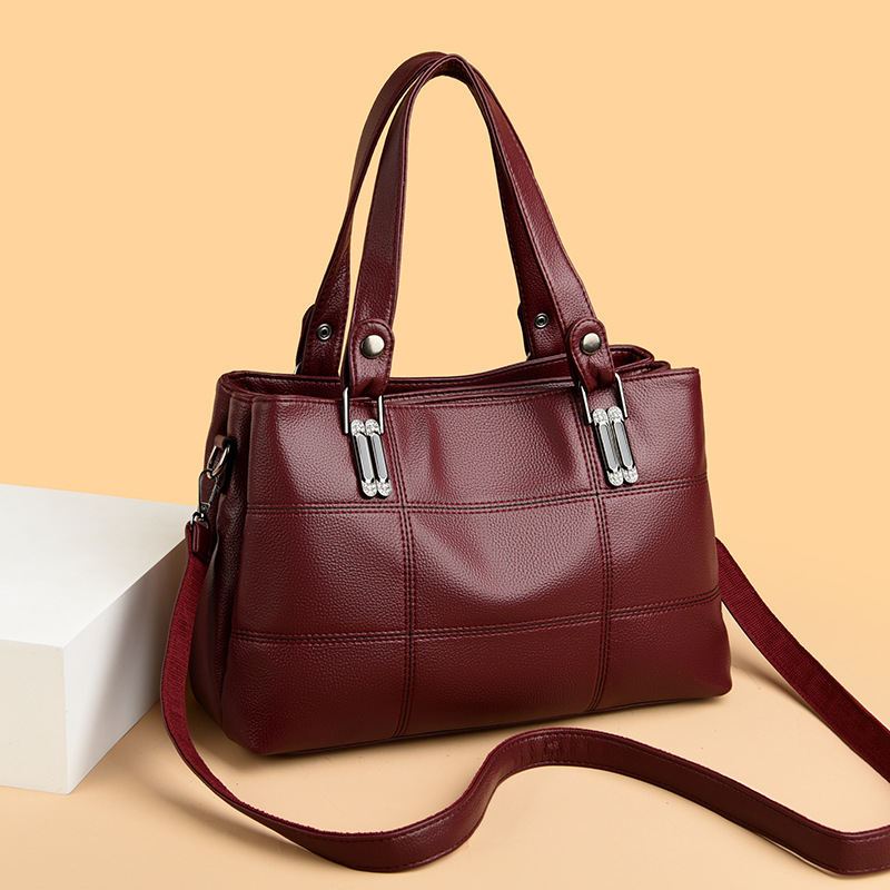 Transfronterizos PU bolsos de mano para mujeres nuevas bolsas de mano simples de gran capacidad, bolsas de moda de madres de mediana edad