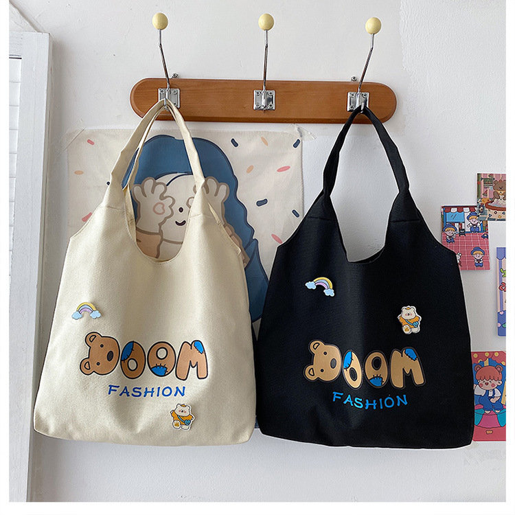 2021 Summer Japanese-style simple canvas bag, student backpack, single-shoulder handbag for going out, cartoon badge cotton bag undefined