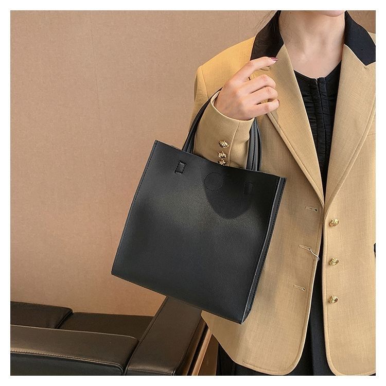 2024 New Bags Korean Version Versatile Commuting Bags Large Capacity Portable Tote Bag Temperament Popular Women’s Bag Vertical Style_voghion.com