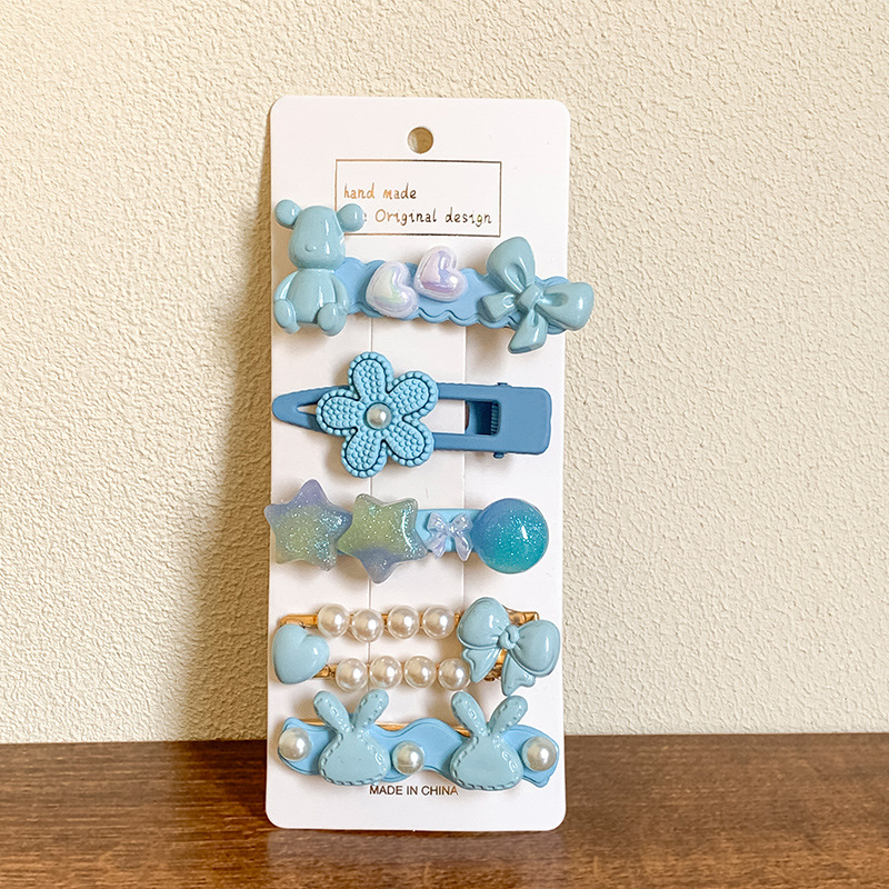 Ventas directas de fábrica 2025 nueva horquilla de color para mujer nueva pinza de flequillo lateral linda horquilla rota pinza de una palabra dulce