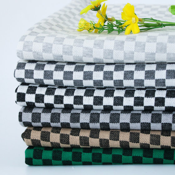 Four seasons popular black and white plaid double-sided knitted fabric 320g checkerboard drape women's casual skirt knitted surface