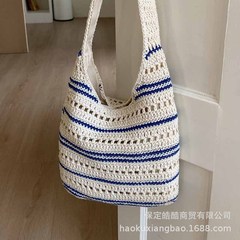 松弛感大容量镂空针织包包女2025新款时尚宽肩带斜挎包通勤托特包