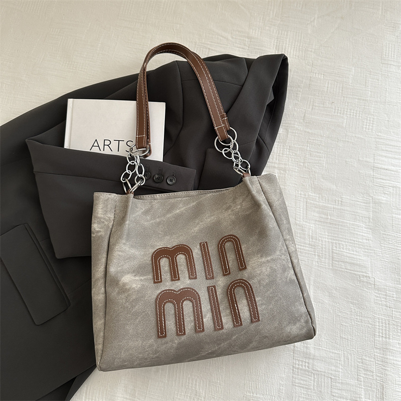 Bolso de otoño de mujer de gran capacidad de transporte 2024 nuevo bolso de hombro de moda nicho de alto nivel bolso de brazo