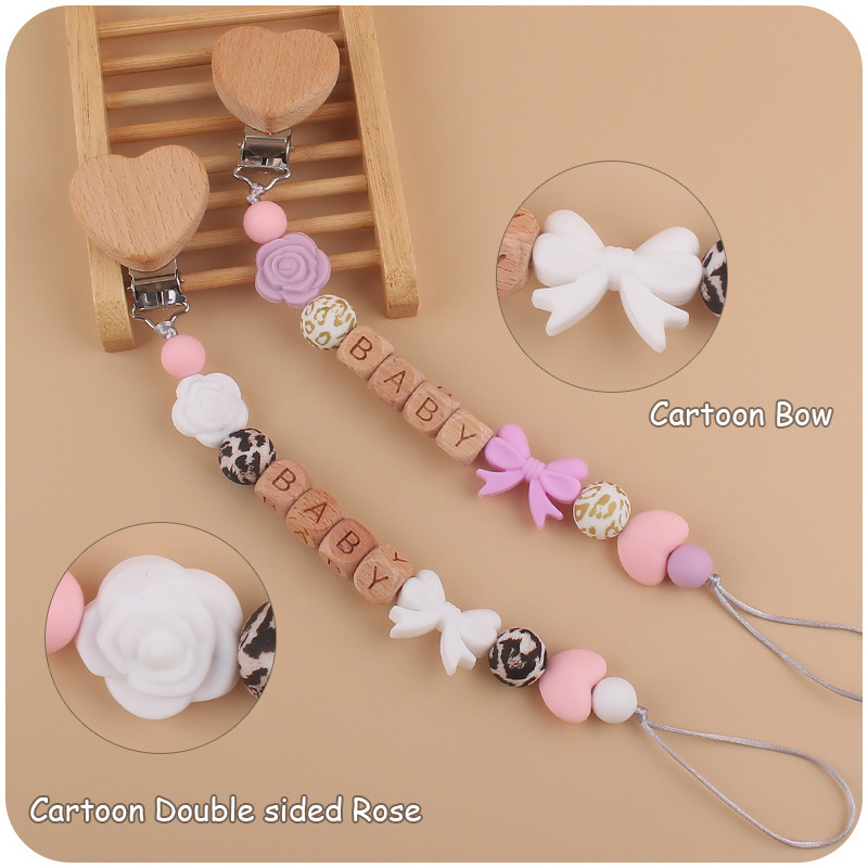 Nuevo bebé suministros dibujos animados amor Haya clip calmante bebé silicona arco pezón cadena anti-caída