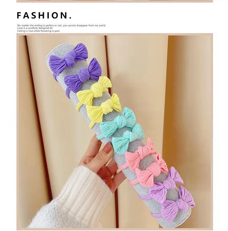 Banda de pelo de color caramelo de alto aspecto banda cuerda 2022 nuevo color cuerda de pelo popular en línea popular banda de goma para mujeres