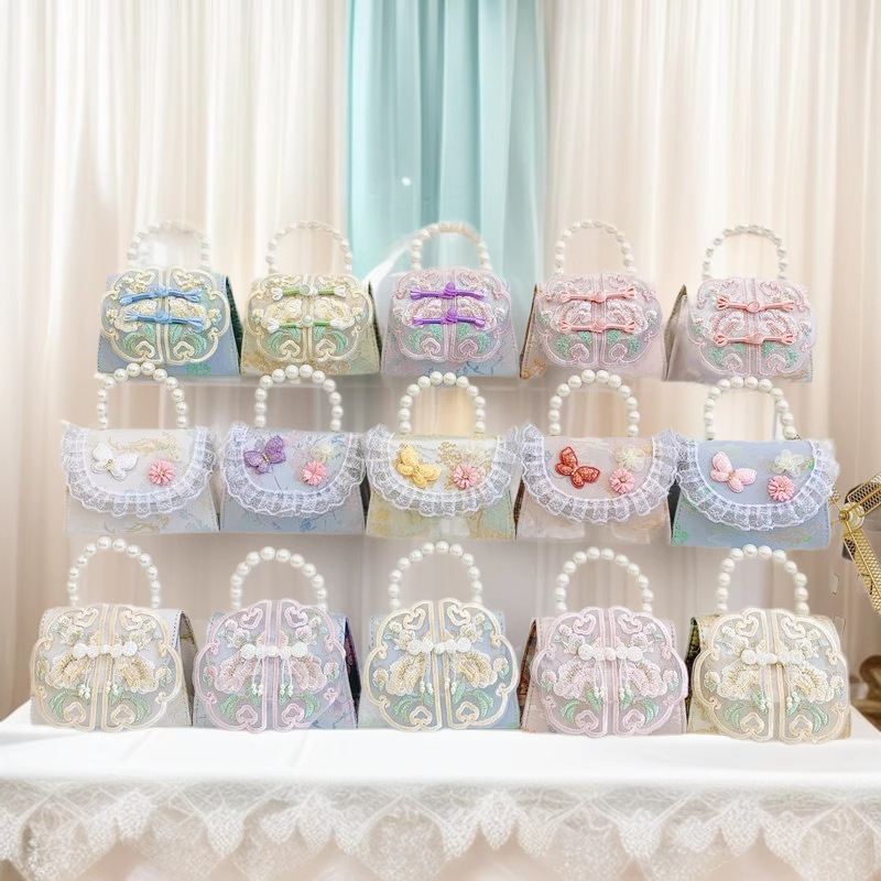 Nuevo estilo chino retro bolso de perla de viento 2025 bolso de cambio sobre rojo bolso de princesa de niñas Hanfu