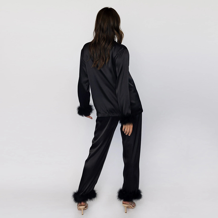 conjunto de top y pantalón de color sólido de cintura alta suelta con solapa de manga larga de plumas NSSQS132006