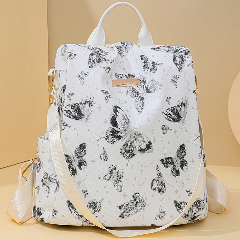 Mochila antirrobo para mujer 2024 otoño nueva mochila de cuero suave para mujer impresión de moda mochila de viaje de gran capacidad marea