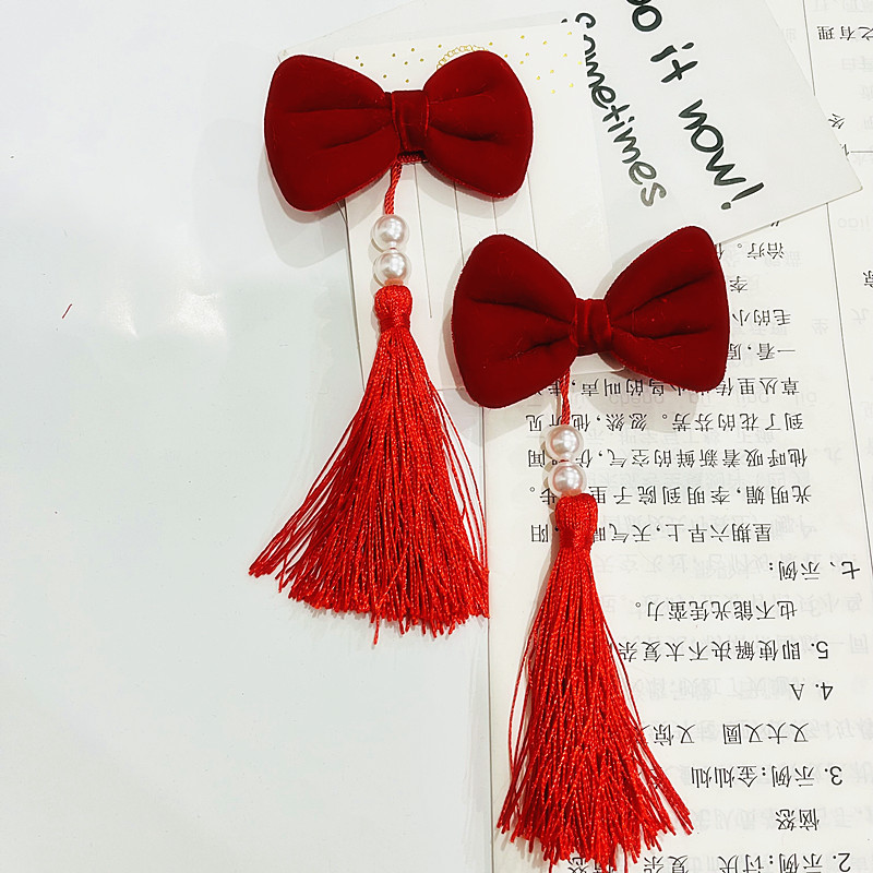 红色毛球珍珠流苏发夹