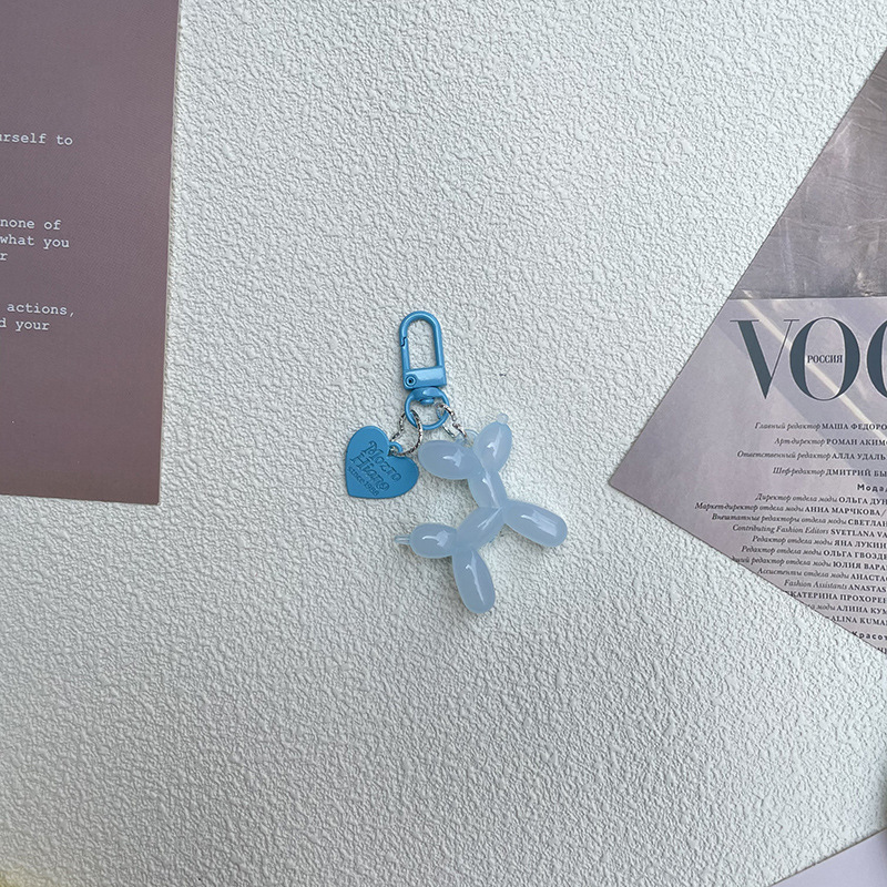 Pequeño Libro Rojo mismo lindo jalea globo láser perro llavero colgante colorido cachorro de dibujos animados teléfono llavero