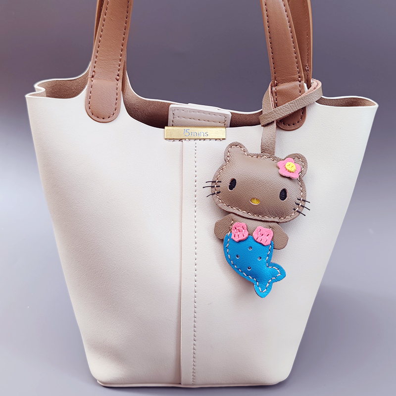 黑皮美人鱼真皮皮包公仔可爱夏威夷真皮包玩偶挂件挂饰hellokitty|undefined