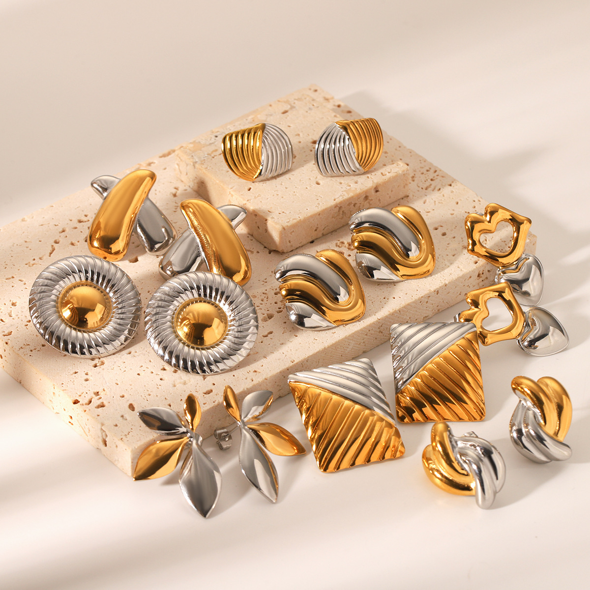 Oro y plata de Europa y América, pendientes de acero inoxidable de color geométrico, nicho femenino, pendientes de acero de titanio de alta calidad, joyas transfronterizas no se desvanecen