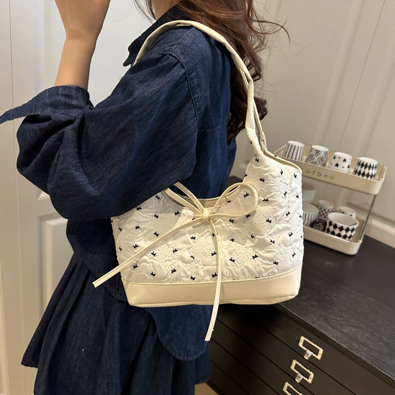 Universal capacious one-shoulder bag with bow