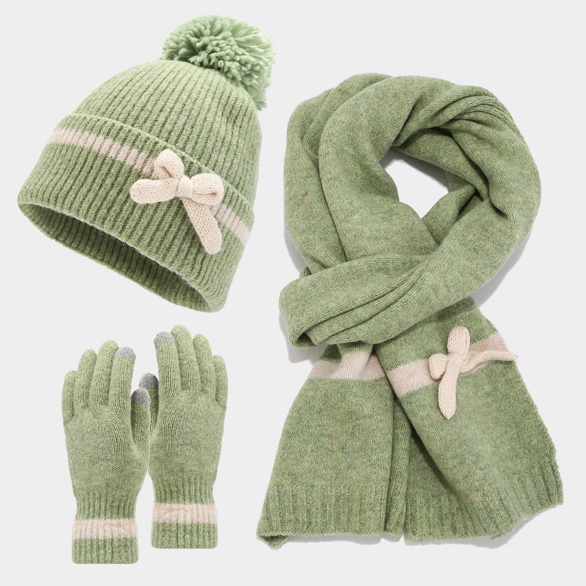 Versión coreana del sombrero decorativo con lazo de invierno, bufanda, guantes, traje de tres piezas, traje de sombrero cálido y a prueba de frío de moda dulce