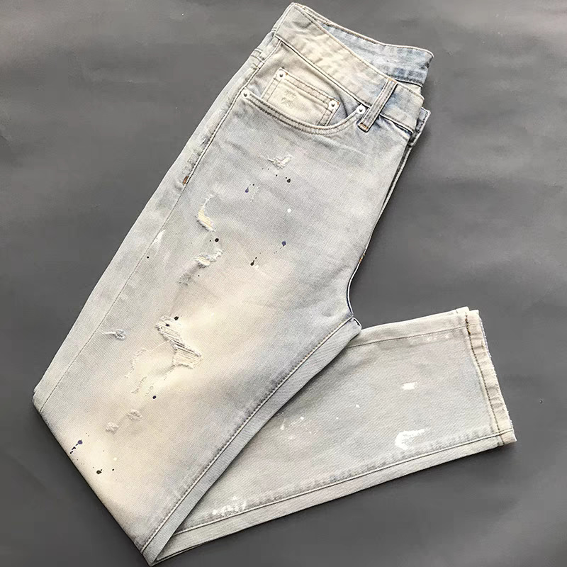 Jeans uomo slim fit elasticizzati con strappi e patch casual_voghion.com