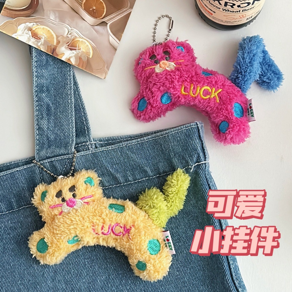 Caricaturas creativas lindas y coloridas LUCK onda punto gato muñeca colgante barra de torsión muñeca de cola colgante mochila chica