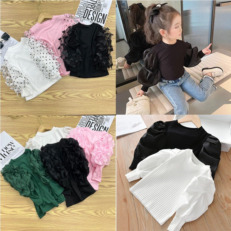 女の子の泡の袖の底のシャツの2025春秋は新型の子供の小さい子供の洋風の長袖のtシャツの韓国版の上着を詰めます。