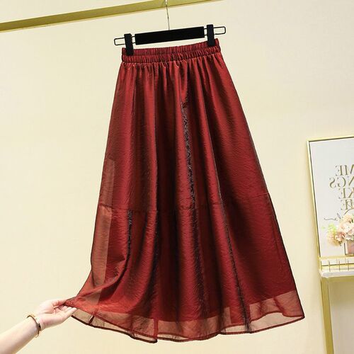 Elegant mid-length chiffon skirt with high waist, featuring a dreamy 