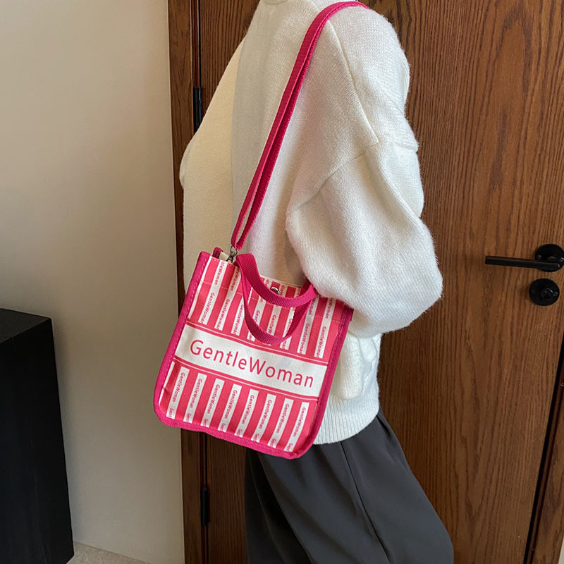 Moda rayas bolsa de lona para mujeres 2023 nueva carta impresión portátil bolsa de compras bolso de hombro al por mayor