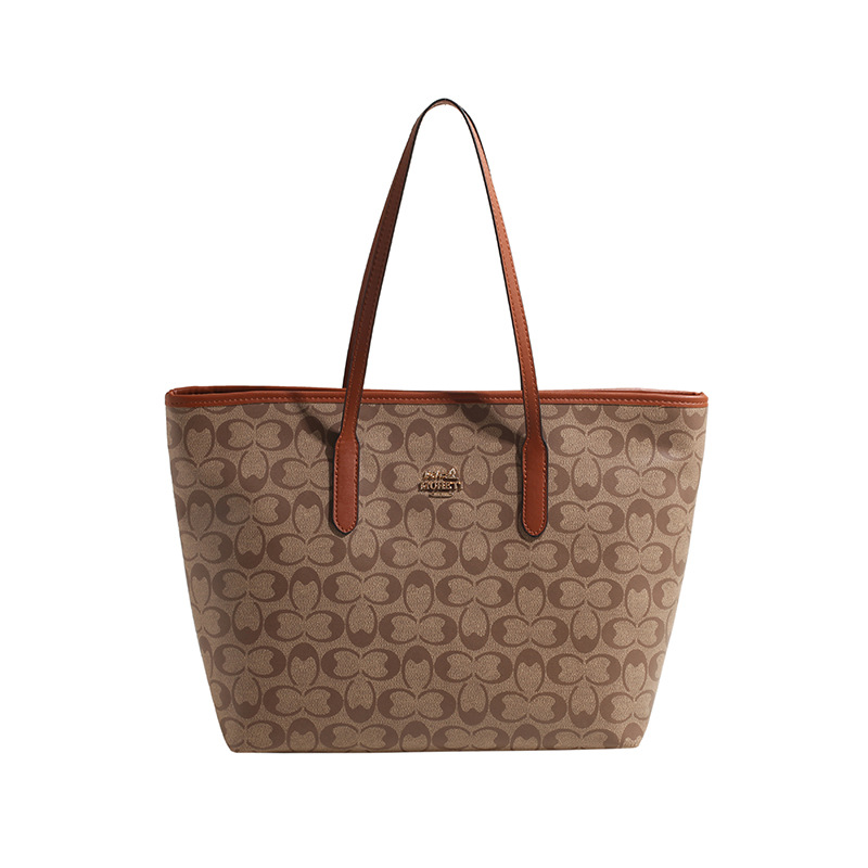 Bolso de gran capacidad para mujeres 2025 nueva moda transfronteriza bolso de hombro de moda de alta calidad bolso de viaje de trabajo casual