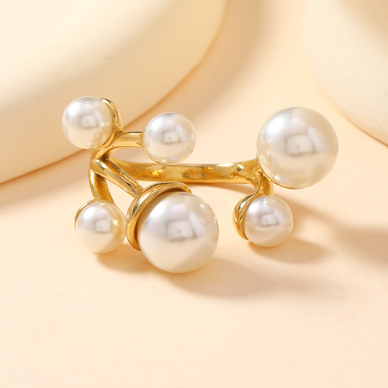 Anillo de perlas de moda europea y americana no se desvanece seis perlas abiertas anillo ligero de lujo de alta calidad joyas de acero inoxidable