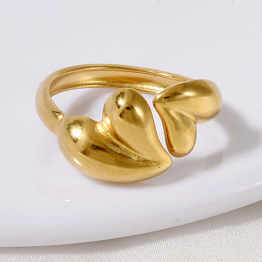 High-end Stainless Steel Couple Ring 18k Gold Hollow Pattern_voghion.com