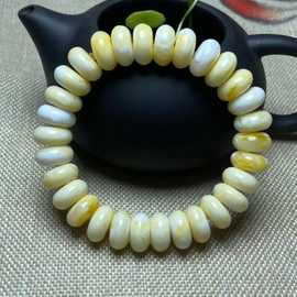 二代琥珀蜜蜡瓷白妖花手串鼓珠隔片手串男女情侣礼物