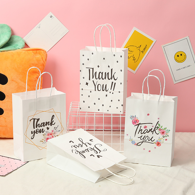 Cross-border new arrival gift bag, fashionable ins-style English birthday party, simple floral hand-carried kraft paper bag, manufacturer direct