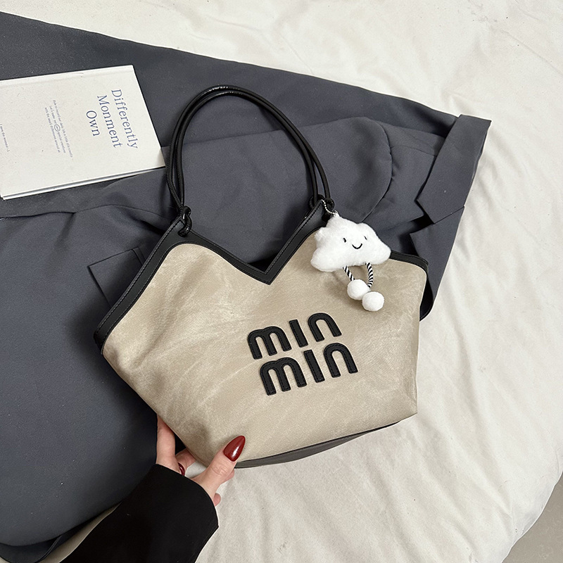 2024 nueva bolsa de gran capacidad para mujeres, bolso de hombro Sen Meng, bolso de diseño de nicho, bolso de viaje de alta calidad para mujeres