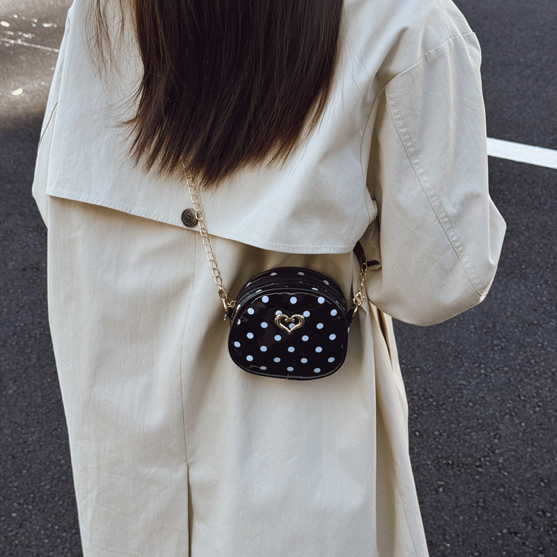 2026 nuevo bolso de niños dulce amor extranjero punto de onda bolso de cadena para hombres y mujeres bolso de comercio exterior mini bolso de bebé