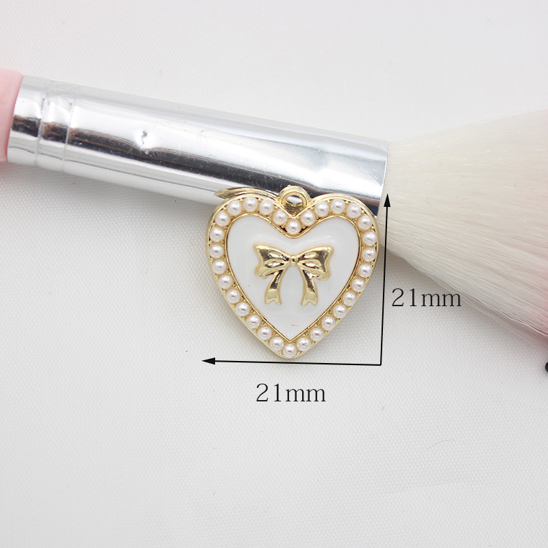 10 PCS/Package 1.5 * 20mm 14 * 14mm 7 * 12mm Alloy Rhinestones Pearl Number Heart Shape Bow Knot Polished Pendant display picture 6