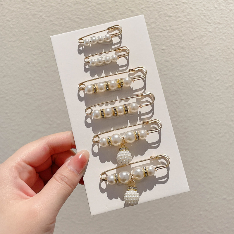 Falda con hebilla de cintura de perlas, circunferencia de cintura grande, cambio de artefacto, hebilla anti-luz, ropa, broche de diseño fijo