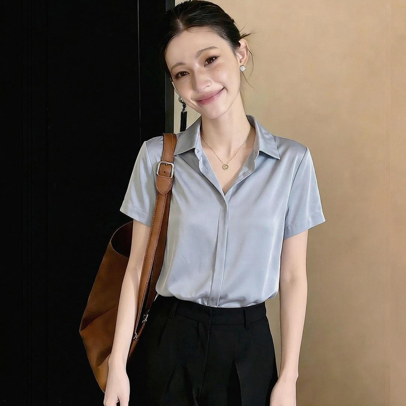 Elegant concealed button placket satin summer gray-blue shirt with a unique design, loose fit, versatile for commuting and professional wear Elegant concealed button placket satin summer gray-blue shirt with a unique design, loose fit, versatile for commuting and professional wear