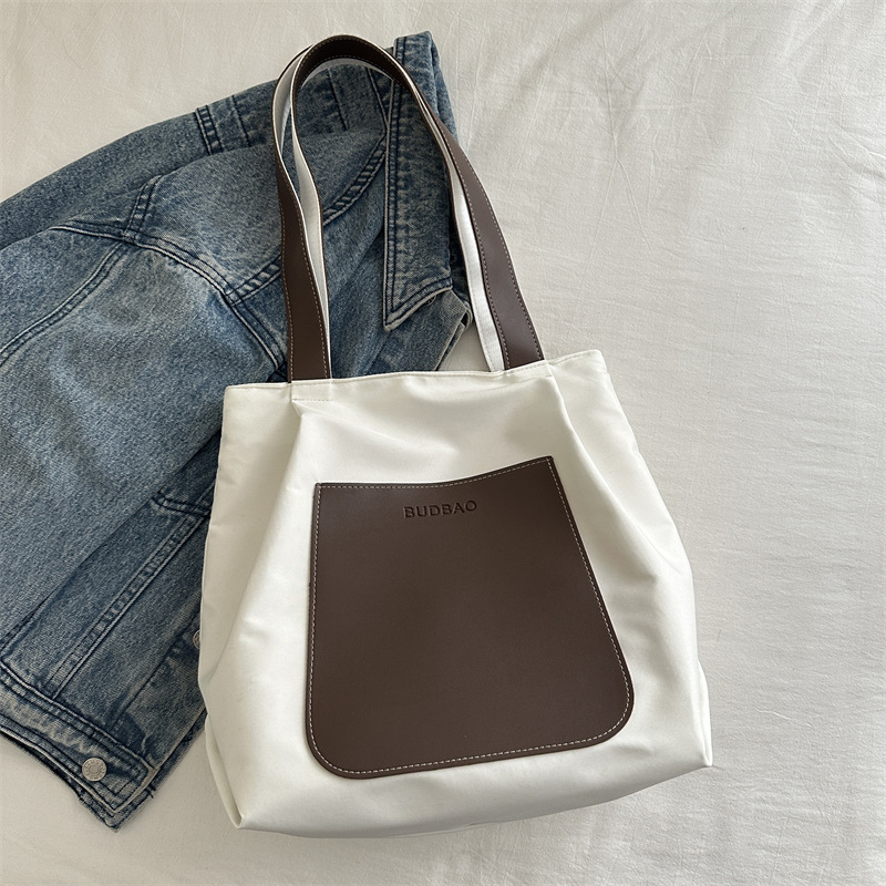 Bolso de mano simple 2024 invierno nuevo bolso de ocio versátil ains este año, bolso de hombro coreano para mujeres