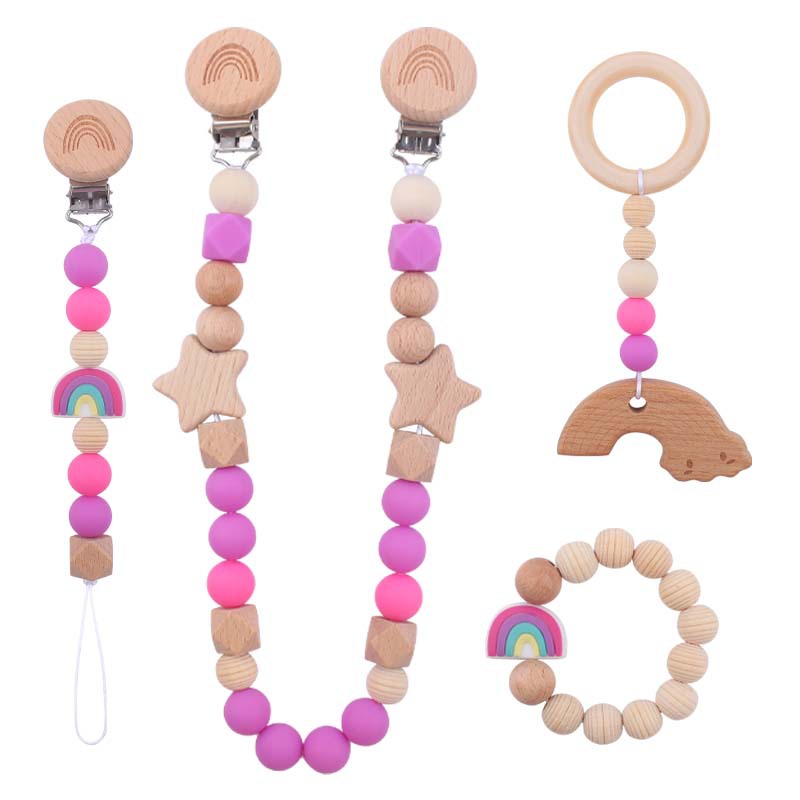 Nuevo bebé suministros dibujos animados silicona Arco Iris mordedor calmante bebé chupete cadena coche colgando mordedor conjunto de cuatro piezas