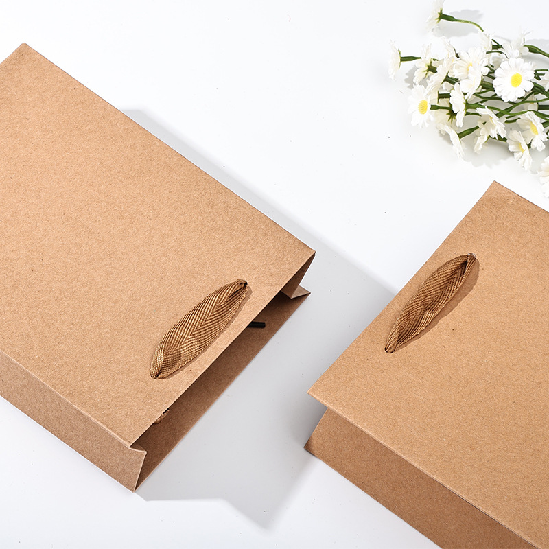Bolsa de papel de cartón blanco engrosada y respetuosa con el medio ambiente portátil, pastel de luna de té, bolsa de embalaje de regalo de alta gama, bolsa de regalo de ropa, venta al por mayor transfronteriza