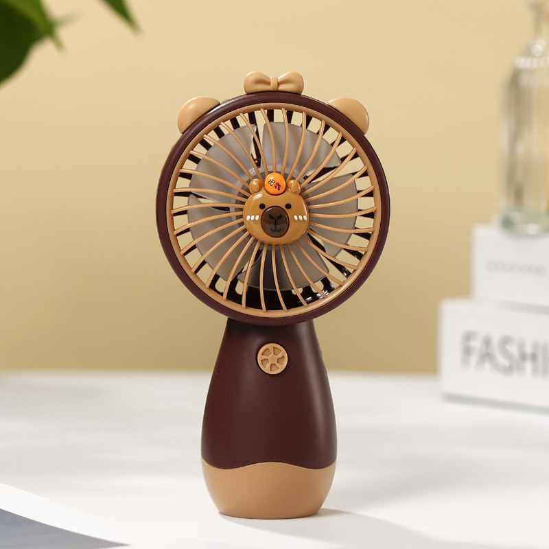 新しい花のミニは小さい扇風機を持っています。|undefined