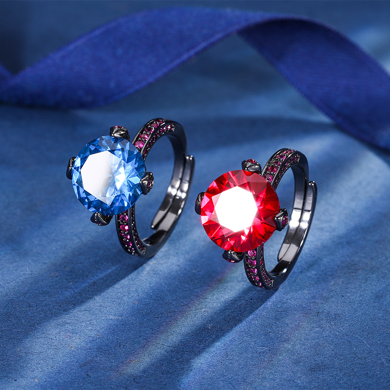 2024 Nueva Zhuang Sheng joyería de cobre de fondo chapado en oro de simulación corindón redondo anillo de personalidad de Oro Negro femenino 12mm