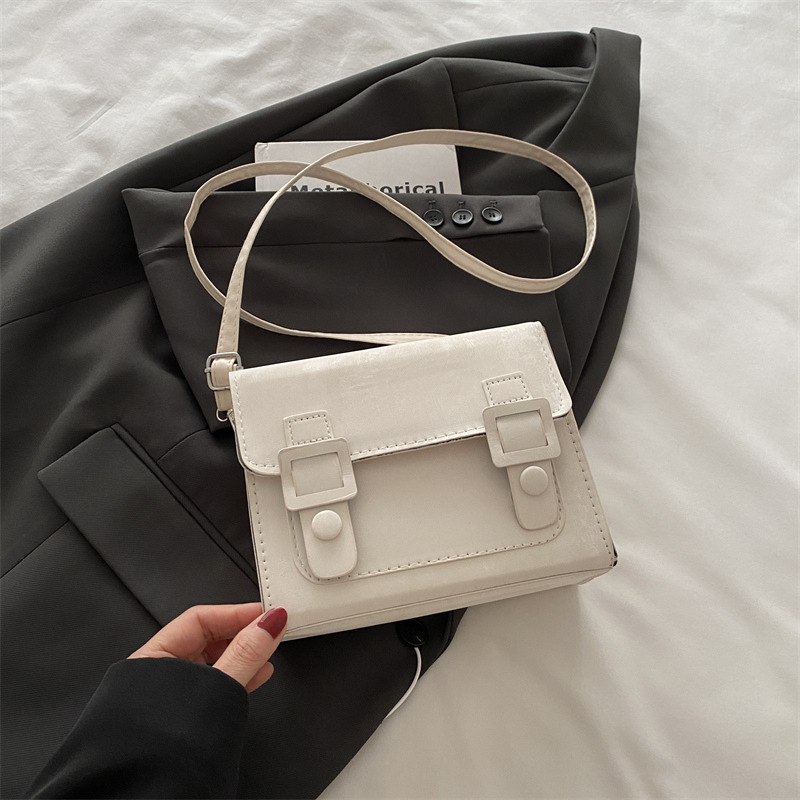 Bolso Cambridge bolso femenino 2025 nueva moda retro oso colgante bolso de hombro simple mensajero casual pequeño bolso cuadrado