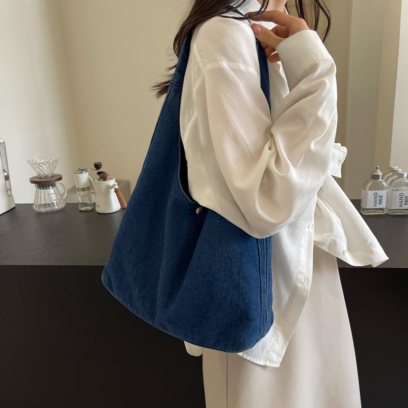 Bolso de mezclilla para mujer 2024 nuevo estilo estilo occidental bolso grande portátil de moda estilo perezoso casual todo fósforo bolso de axila de un solo hombro