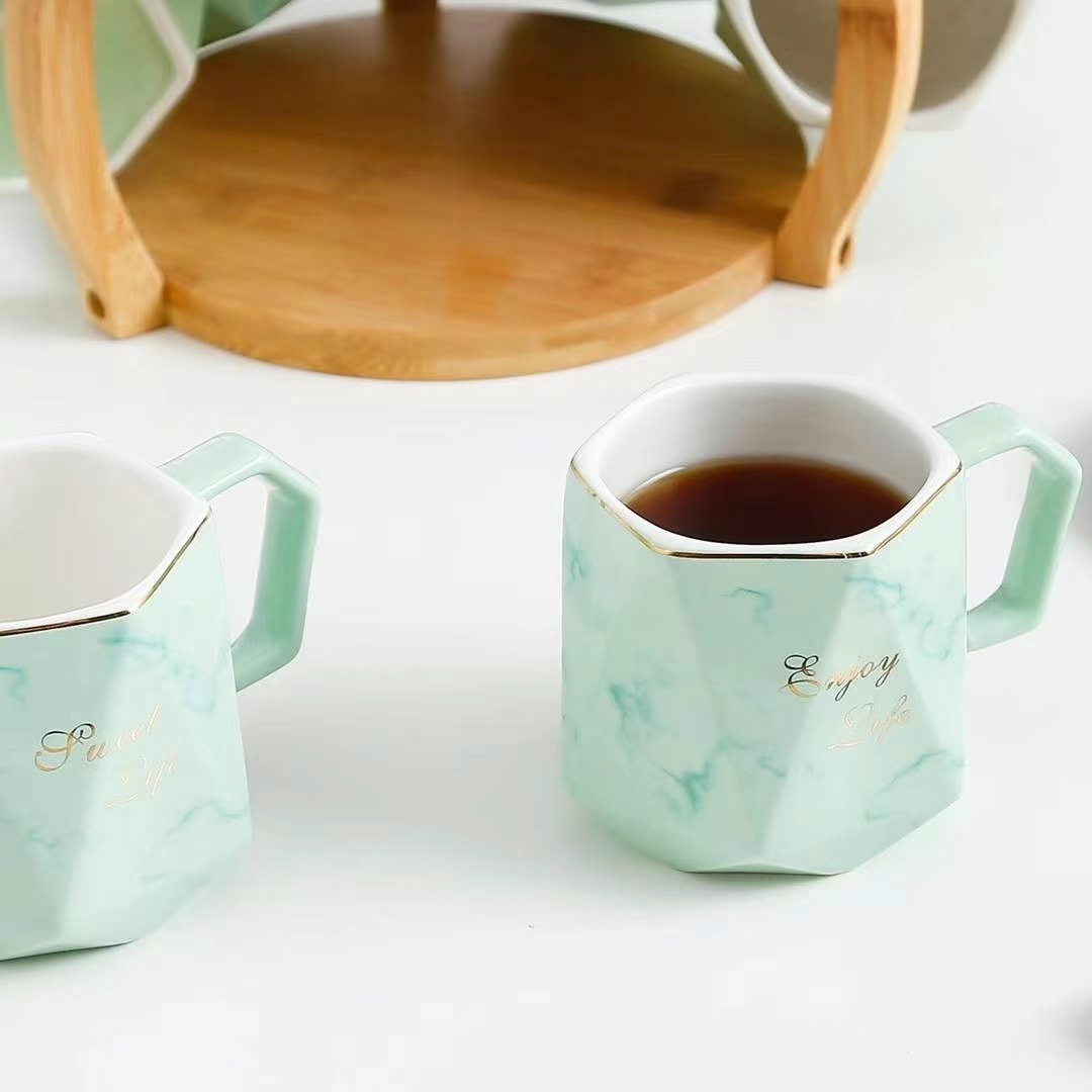 Estilo nórdico creativo conjunto de agua fría traje de cerámica taza con soporte Oficina flor tetera taza de agua marbling