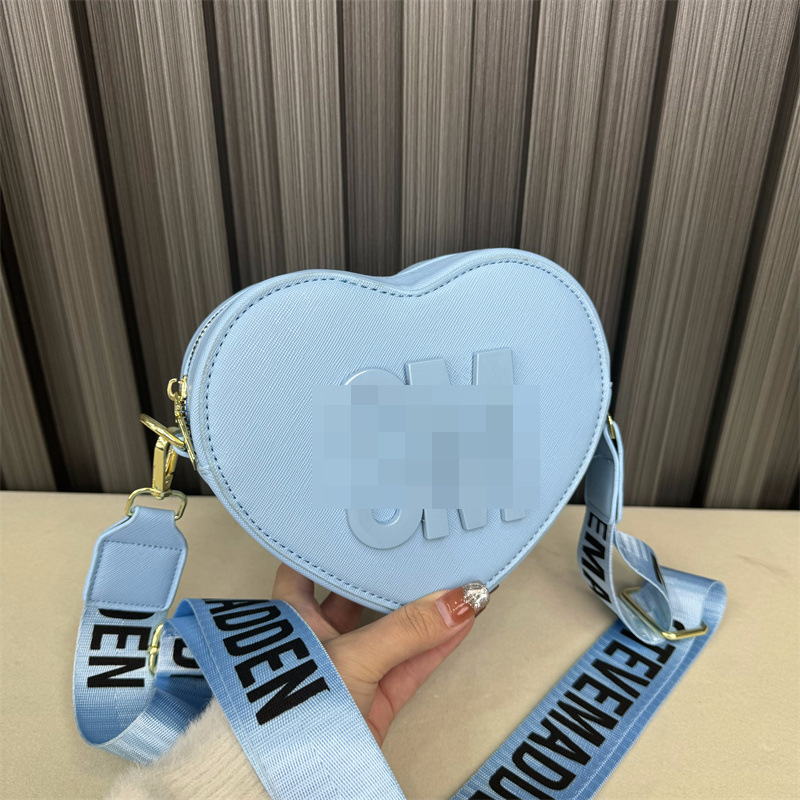 Bolso de hombro transfronterizo para mujer, sentido de alta gama, todo fósforo, letras al por mayor, bolso de mensajero simple, temperamento casual, bolso en forma de corazón