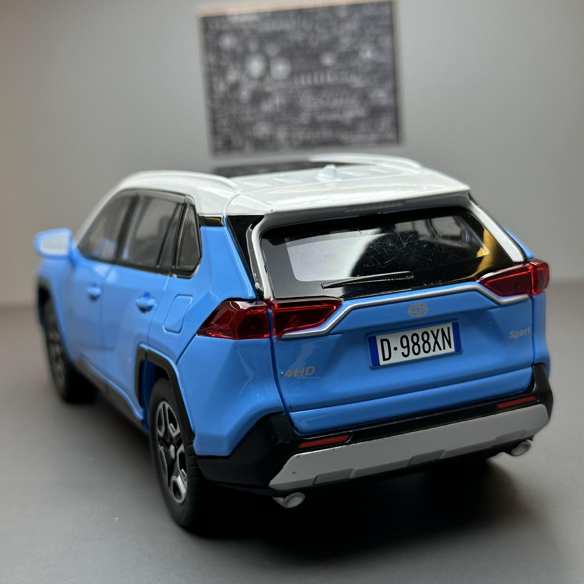 Jiaye 1:22 modelo de coche de aleación RAV4 vehículo todoterreno sonido luz Tire hacia atrás juguete coche música modelo decoración colección
